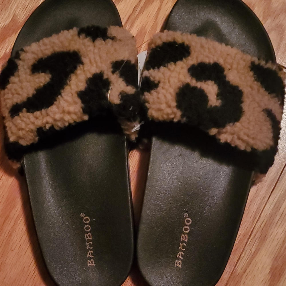 Leopard slides runs small more like a nine
